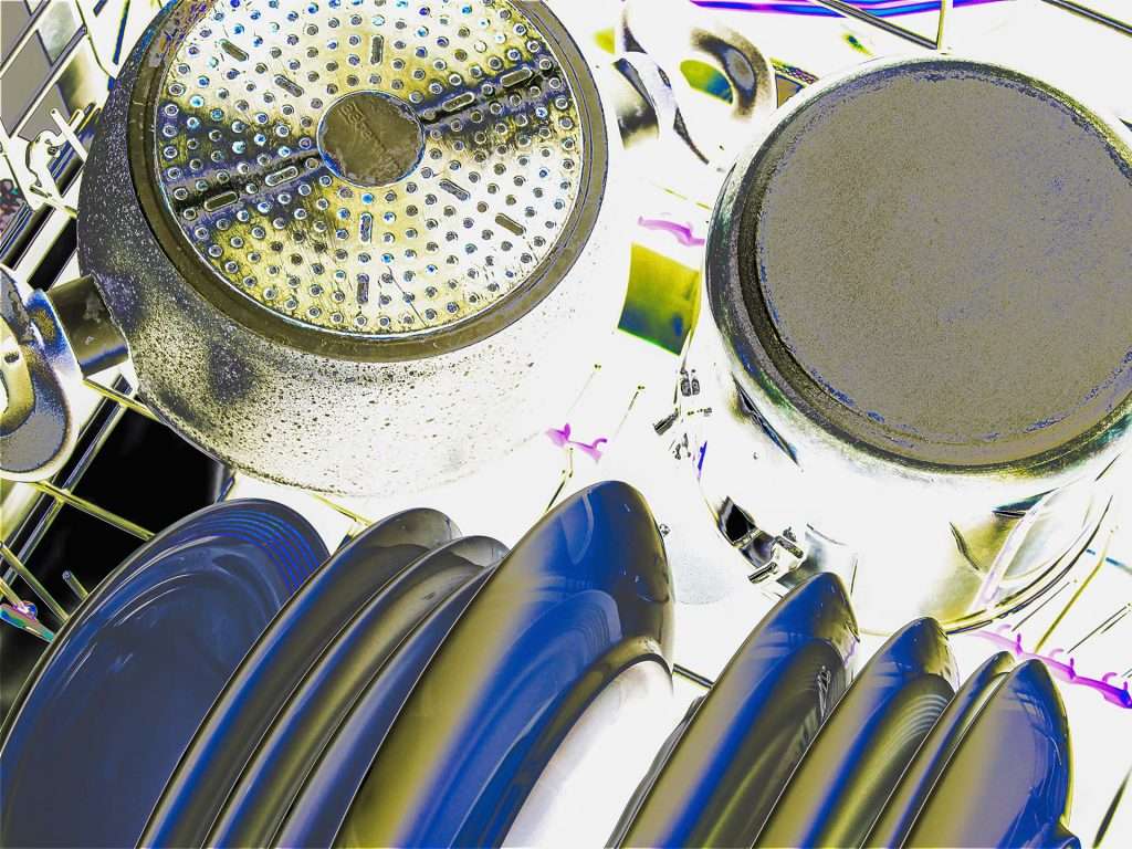 Surrealistic view of household dishes in a rack